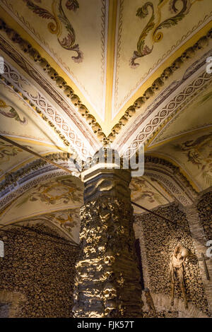 Interior detail of human skulls in the famous 'Bones Chapel', Evora, Alentejo region, Portugal Stock Photo