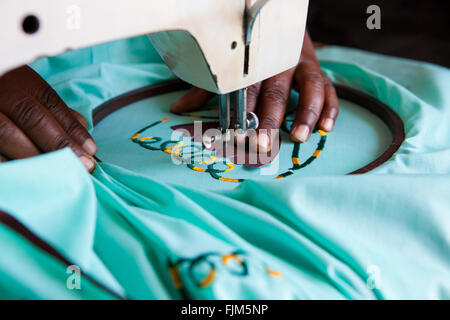 A women using a sewing machine, Tanzania Stock Photo