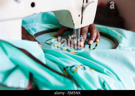 A women using a sewing machine, Tanzania Stock Photo