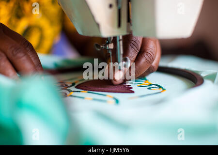 A women using a sewing machine, Tanzania Stock Photo
