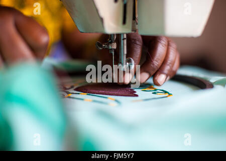 A women using a sewing machine, Tanzania Stock Photo