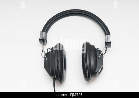 black over head style headphones on a white background Stock Photo