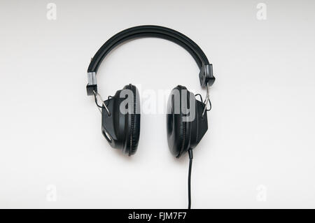 black over head style headphones on a white background Stock Photo
