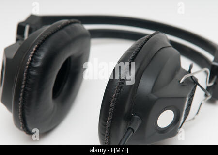 black over head style headphones on a white background Stock Photo