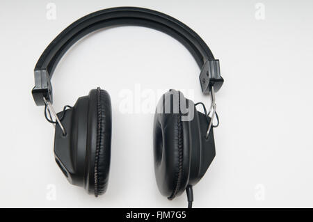 black over head style headphones on a white background Stock Photo