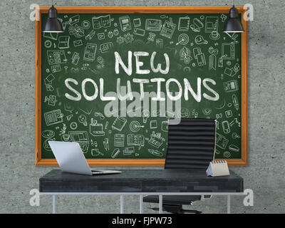 New Solutions on Chalkboard with Doodle Icons. Stock Photo