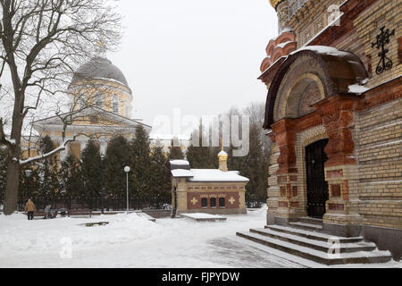 Bridge leading to the Peter and Paul Cathedral and chapel-tomb of Paskevich in city park in Gomel, Belarus. Winter season Stock Photo