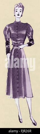 French fashion, dress by Jeanne Lanvin: blade silver dress with colourful crepe trimmed sleeves. Feature entitled 'Les grands couturiers et leur collections' / The great designers and their collections. From Marie Claire, women 's magazine, No.82, September 23, 1938. Jeanne Lanvin, French fashion designer, 1 January 1867 – 6 July 1946. Stock Photo