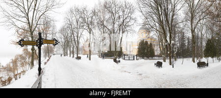 Bridge leading to the Peter and Paul Cathedral and chapel-tomb of Paskevich in city park in Gomel, Belarus. Winter season Stock Photo