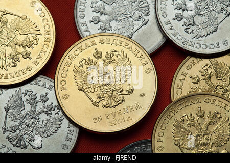 Coins of Russia. Russian double-headed eagle depicted in the Russian commemorative 25 ruble coins. Stock Photo
