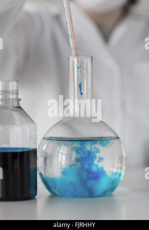 close up of scientist making test in lab Stock Photo