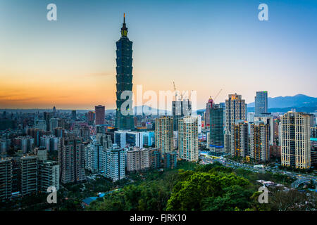 View of Taipei 101 and the Taipei skyline at sunset, from Elephant Mountain, in Taipei, Taiwan. Stock Photo