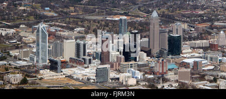 View of Charlotte, North Carolina from a commercial airliner on Sunday, February 28, 2016. Clearly visible landmarks include at left, the Duke Energy Center, Hearst Tower, the Bank of America Corporate Center, and the Time Warner Cable Arena, at center right, home of the NBA Charlotte Hornets. Credit: Ron Sachs / CNP - NO WIRE SERVICE - Stock Photo