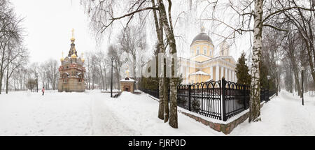 Bridge leading to the Peter and Paul Cathedral and chapel-tomb of Paskevich in city park in Gomel, Belarus. Winter season Stock Photo