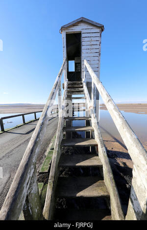 Refuge box on causeway Holy Island of Lindisfarne. Northumberland Stock Photo