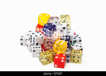 Multi-coloured dice in a heap. Stock Photo