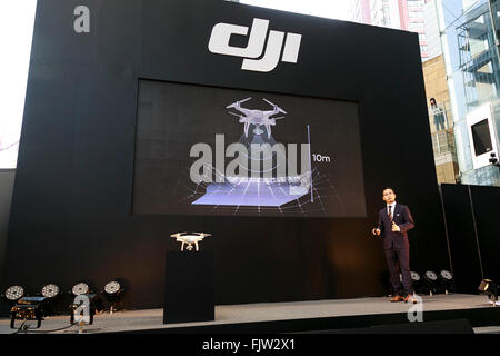 Tokyo, Japan. 3rd March, 2016. Allen Wu, DJI Japan General Manager, introduces the new Phantom 4 that can dodge obstacles and track objects in Roppongi Hills, on March 3, 2016, Tokyo, Japan. DJI's new model integrates a set of stereo cameras and proximity sensors that work with a computer software vision, which allows the Phantom 4 to fly autonomously. The new generation drone includes two newly added features, the ActiveTrack to continuously record a moving object and TapFly that allows users to select waypoints by controlling their smartphone or tablet. Credit:  Aflo Co. Ltd./Alamy Live News Stock Photo