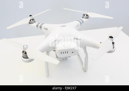 Tokyo, Japan. 3rd March, 2016. The new generation Phantom 4 that can dodge obstacles and track objects on display during a media event in Roppongi Hills on March 3, 2016, Tokyo, Japan. DJI's new model integrates a set of stereo cameras and proximity sensors that work with a computer software vision, which allows the Phantom 4 to fly autonomously. The new generation drone includes two newly added features, the ActiveTrack to continuously record a moving object and TapFly that allows users to select waypoints by controlling their smartphone or tablet. Credit:  Aflo Co. Ltd./Alamy Live News Stock Photo