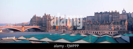 Panoramic view of Edinburgh over Waverley Railway Station along Market Street with North Bridge on left Stock Photo