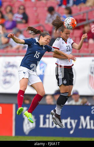 Tampa, Florida, USA. 3rd Mar, 2016. French midfielder ELISE BUSSAGLIA (15) and Germany midfielder SARA DABRITZ (23) go airborne for the ball during the She Believes Cup at Raymond James Stadium © Scott A. Miller/ZUMA Wire/Alamy Live News Stock Photo