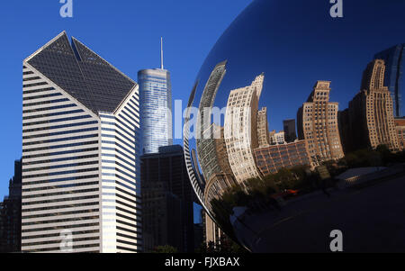 Downtown Chicago skyline reflected in the Cloud Gate 'The Bean' sculpture in Millennium Park in Chicago, Illinois, United States Stock Photo