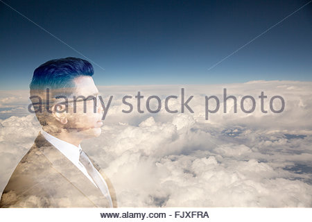 Digital composite businessman with head in clouds
