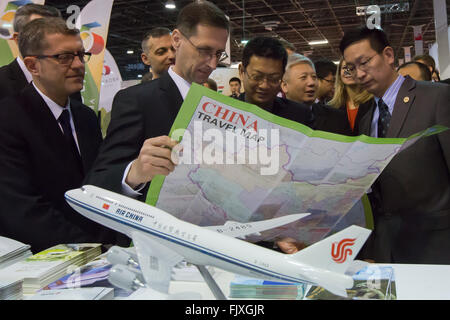 Budapest, Hungary. 3rd Mar, 2016. Hungary's National Economy Minister Mihaly Varga (2nd L) looks at a travel map of China at China's booth during the opening day of 'Travel 2016 International Tourism Exhibition' in Budapest, Hungary, March 3, 2016. Travel 2016, Hungary's largest tourism fair, runs from March 3 to 6 this year, with 28 countries and regions represented. Programs include a China Tourism Information Day conference and a professional workshop. © Attila Volgyi/Xinhua/Alamy Live News Stock Photo