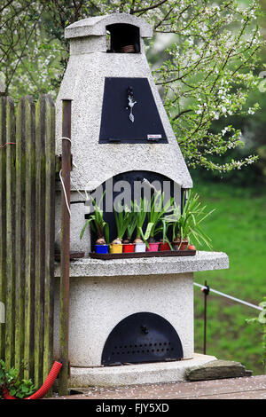 Garden grill during spring, garden fireplace Stock Photo