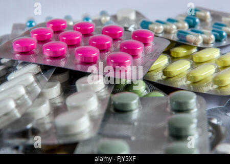 Capsules and colorful Pills tablets drugs Stock Photo