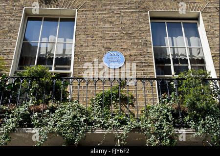 A blue commemorative plaque on the exterior wall of Sherlock Holmes Museum in London, United Kingdom. Stock Photo