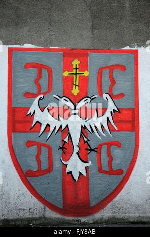 Street art graffiti double headed eagle with Christian cross Belgrade Serbia Stock Photo