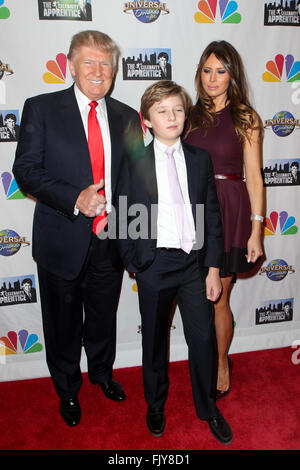 Donald Trump, son Barron Trump and Melania Trump attend 'The Celebrity Apprentice' finale at Trump Tower on February 16, 2015. Stock Photo