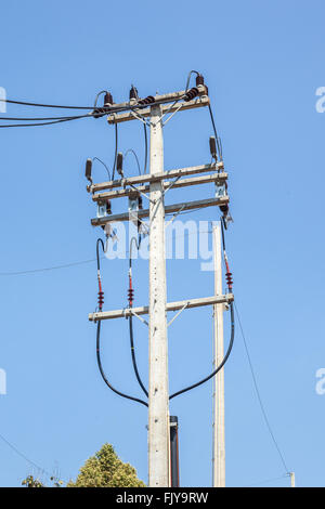 electricity post on blue sky background Stock Photo