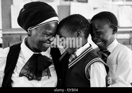 Johannesburg, Gauteng, South Africa. 30th Nov, 2015. 20 years after democracy most black children in South Africa continue to receive an education which condemns them to the underclass of South African society, where poverty and unemployment are the norm, not the exception. In Southern Africa there are different programmes, presented by organisations such as Room to Read, Spell It SA and many others which are aimed at improving literacy. In South Africa, of 100 kids that start Grade 1, 48 will write Gr12 exams, 36 will pass, 14 will qualify to enter university, 7 will complete their degre Stock Photo