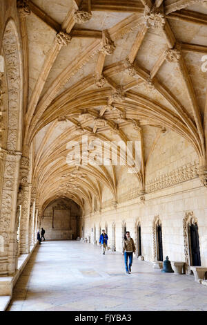 Portugal, Lisbon: Tourists in the medieval cloister of Jeronimos Monastery in Belém Stock Photo