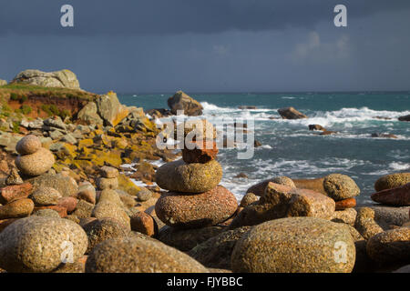 Rock piles on the beaches of the Scilly Isles, Cornwall Stock Photo