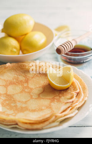 Lemon Pancakes and Bowl of Lemons Stock Photo