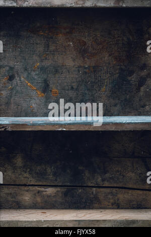 Empty old shelf on wooden background Stock Photo