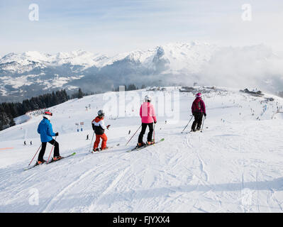 Skiers skiing on snow slopes in Samoens-Morillon ski area at Samoens 1600 in French Alps. Samoens  Haute-Savoie Rhone-Alpes France Stock Photo