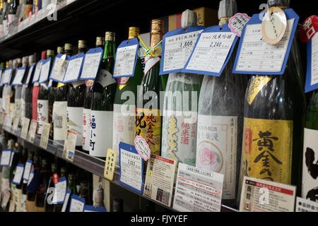 Bottles of Sake on Display in Akita Public Market, Akita, Japan Stock Photo