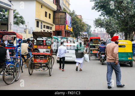 pedestrians delhi tuk tuks rickshaws