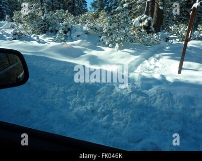 Ash Creek, California, with snow covered ground, shrubs along roadside, wild life area is frequented by visitors, campers and hu Stock Photo