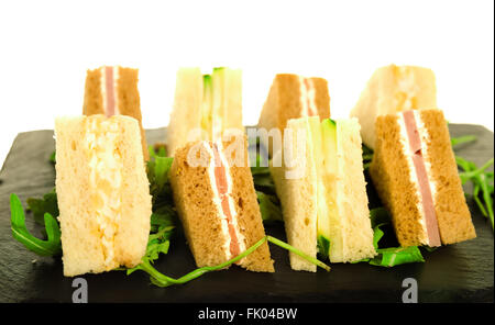 Plate of Many Mini Bite Size Sandwich Appetizers. Party Food, Finger Food, Sliders. Fresh Mini Bread with Cream Cheese, Smoked S Stock Photo