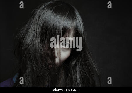 Dark portrait of a pale japanese woman. Halloween and horror Stock Photo