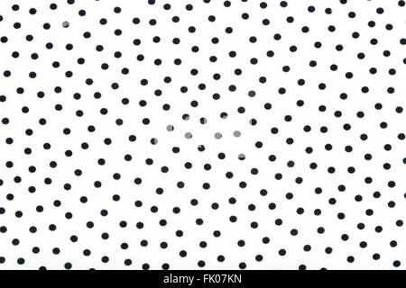 seamless white fabric with black dots as background Stock Photo