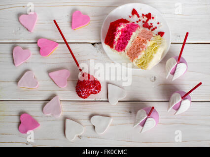 Sweet composition, cakepops, cookies and cake on plate
