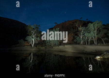 Night stars of the swimming hole reflections of Ormiston Gorge West MacDonnell Ranges Alice Springs Stock Photo