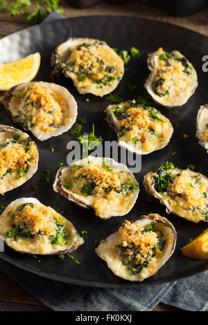 Homemade Creamy Oysters Rockefeller with Cheese and Spinach Stock Photo