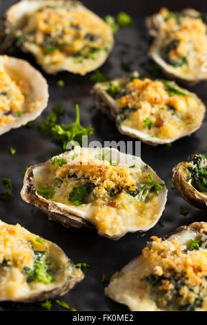 Homemade Creamy Oysters Rockefeller with Cheese and Spinach Stock Photo