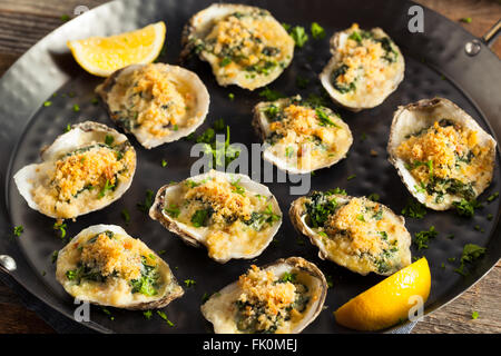 Homemade Creamy Oysters Rockefeller with Cheese and Spinach Stock Photo